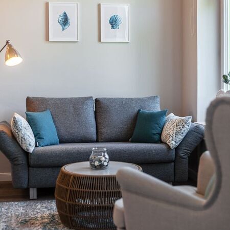 Innenansicht des Appartements Flamingo mit Sofas