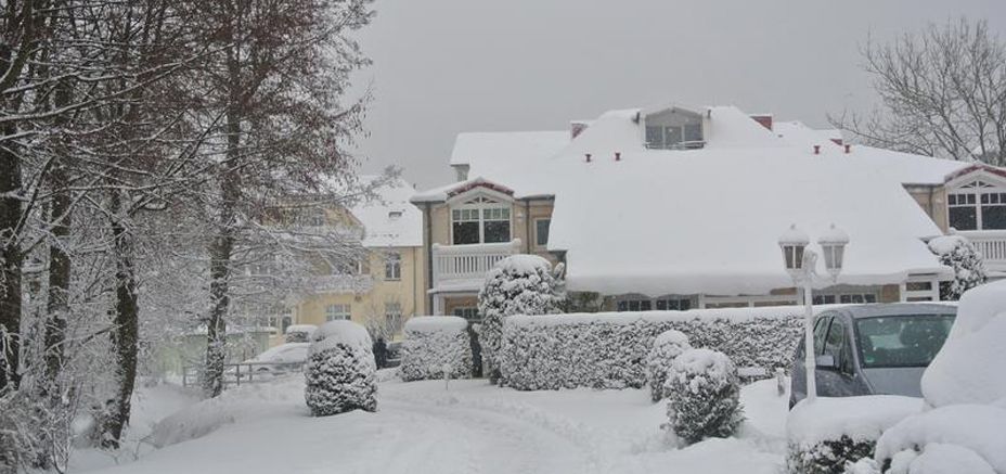 Unsere Ferienwohnungen im Winter von Schnee bedeckt